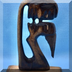 D69. Wood carved kiss sculpture. 9”h - $18